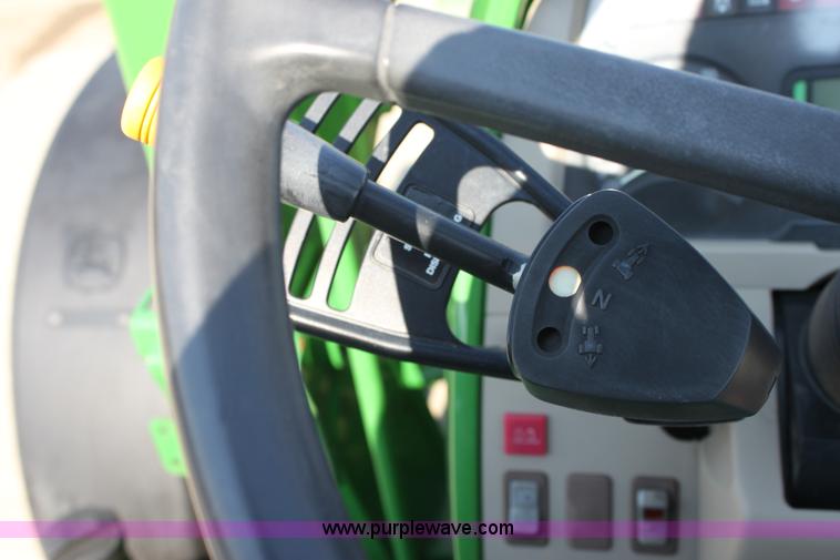 image for item A2009 2005 John Deere 6420 MFWD tractor with loader