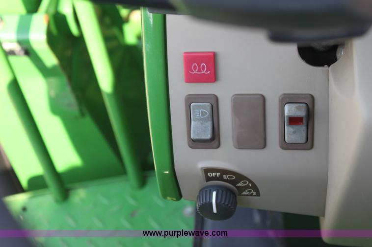 image for item A2009 2005 John Deere 6420 MFWD tractor with loader