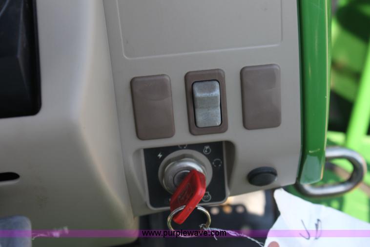 image for item A2009 2005 John Deere 6420 MFWD tractor with loader