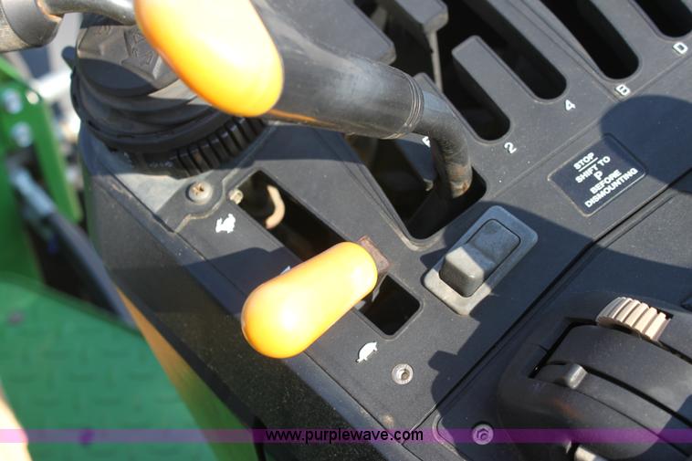 image for item A2009 2005 John Deere 6420 MFWD tractor with loader