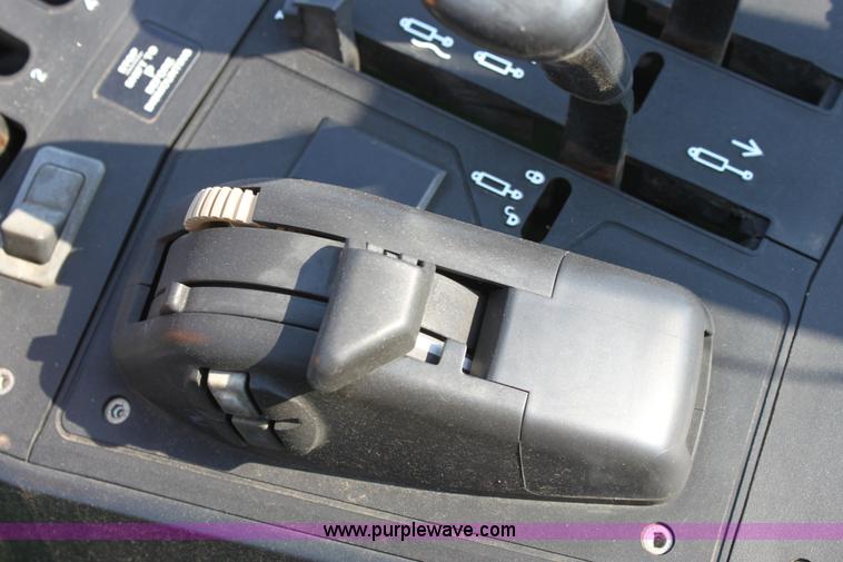 image for item A2009 2005 John Deere 6420 MFWD tractor with loader