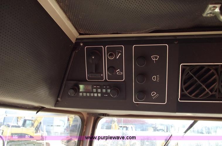 image for item A4230 1990 Massey-Ferguson 8570 RWA combine