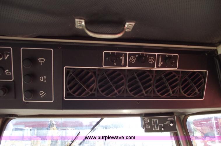 image for item A4230 1990 Massey-Ferguson 8570 RWA combine