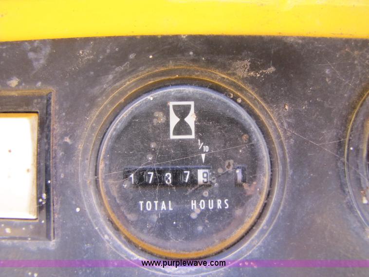 image for item A4690 1987 John Deere 575 skid steer loader