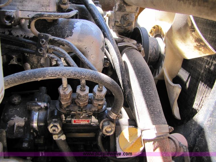 image for item A4690 1987 John Deere 575 skid steer loader