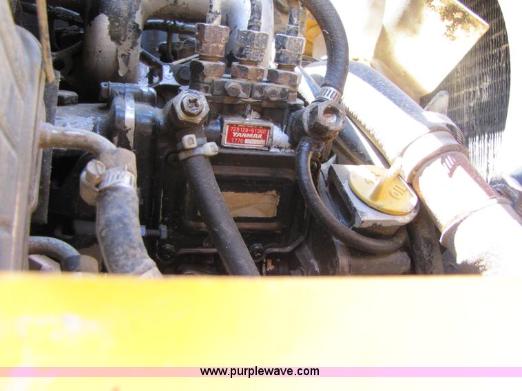 image for item A4690 1987 John Deere 575 skid steer loader