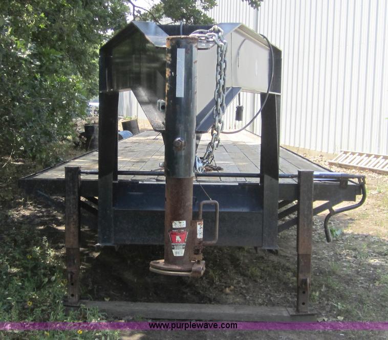 image for item A4797 2006 Progressive flatbed goose neck trailer