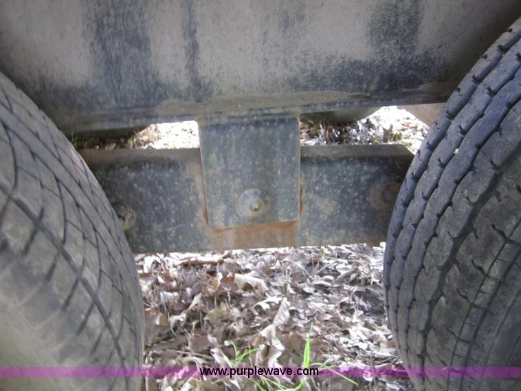 image for item A4797 2006 Progressive flatbed goose neck trailer