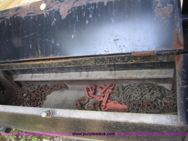 image for item A4797 2006 Progressive flatbed goose neck trailer