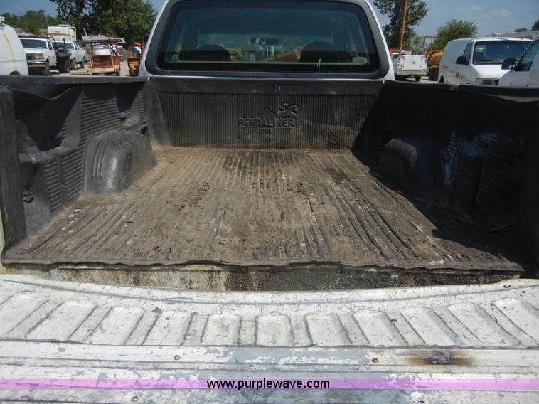 image for item A3009 1999 Ford F250 extended cab pickup truck