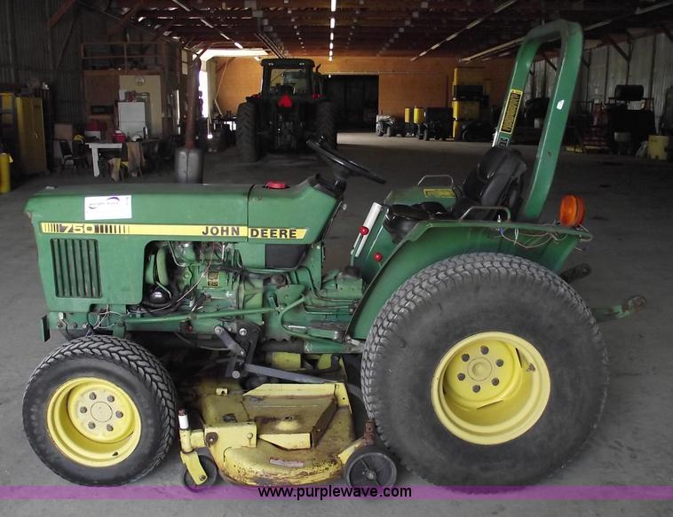 image for item A4198 John Deere 750 tractor with belly mower