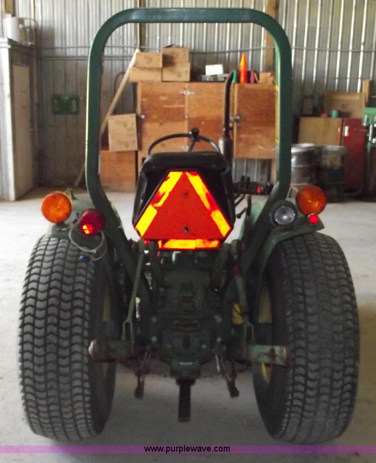 image for item A4198 John Deere 750 tractor with belly mower