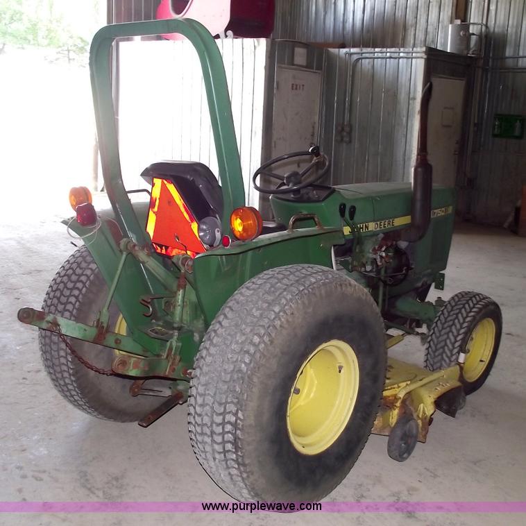 image for item A4198 John Deere 750 tractor with belly mower