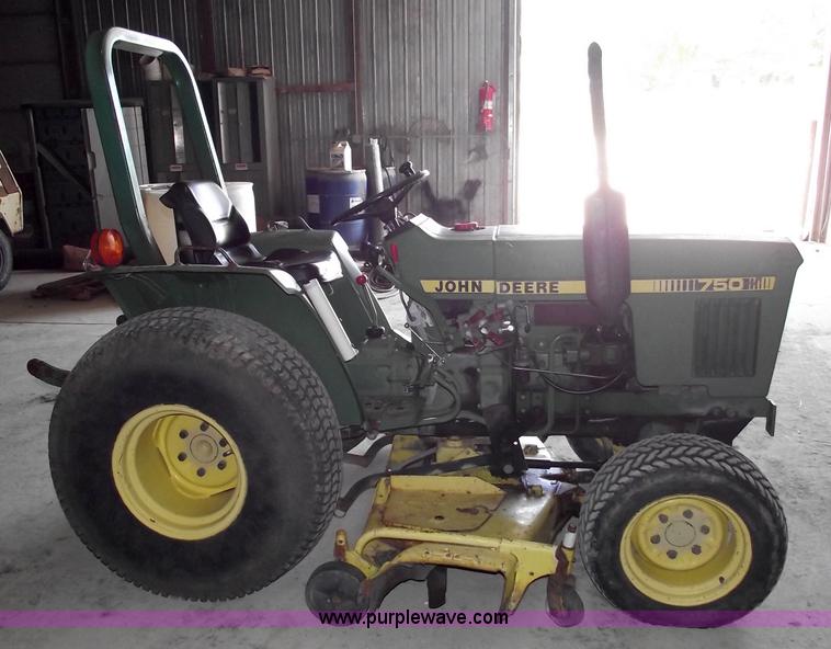 image for item A4198 John Deere 750 tractor with belly mower