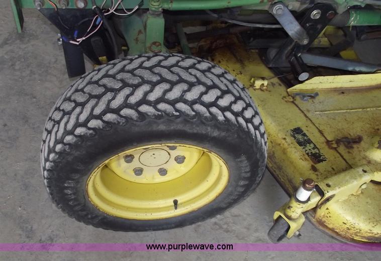 image for item A4198 John Deere 750 tractor with belly mower