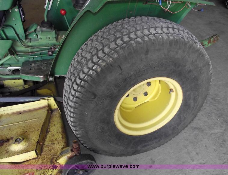 image for item A4198 John Deere 750 tractor with belly mower