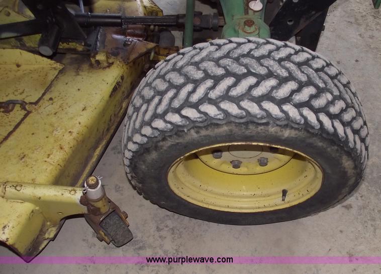 image for item A4198 John Deere 750 tractor with belly mower