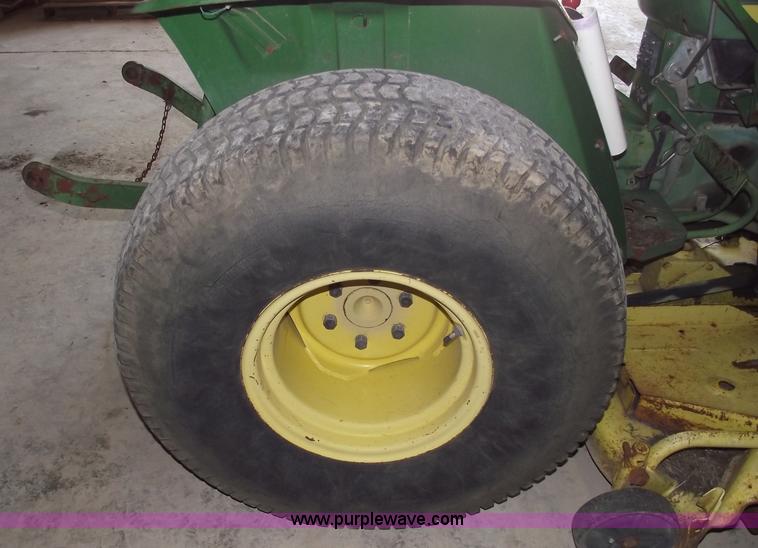 image for item A4198 John Deere 750 tractor with belly mower