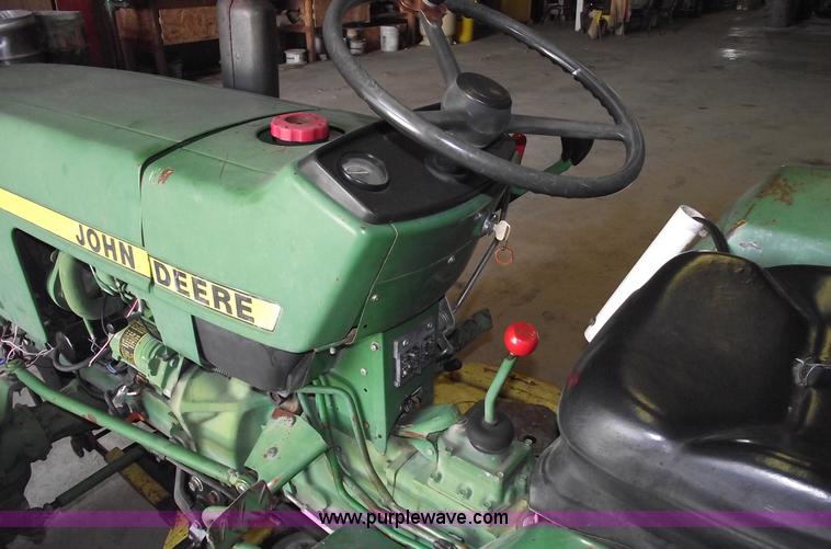 image for item A4198 John Deere 750 tractor with belly mower