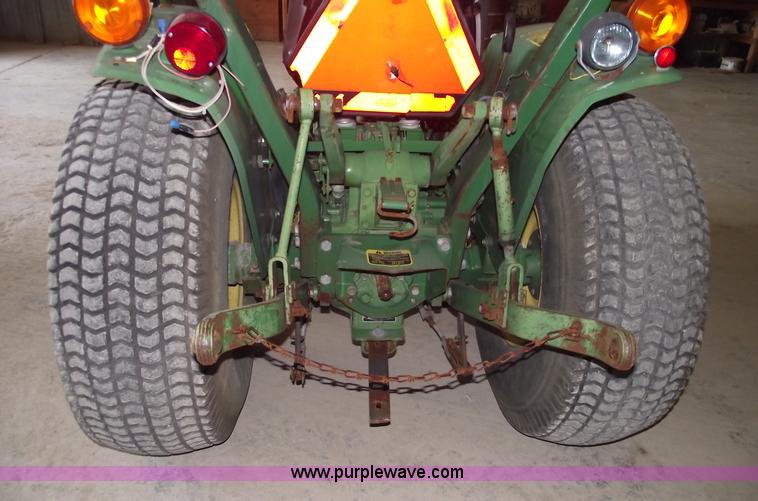 image for item A4198 John Deere 750 tractor with belly mower