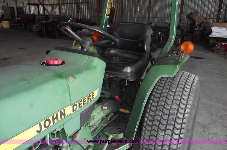image for item A4198 John Deere 750 tractor with belly mower