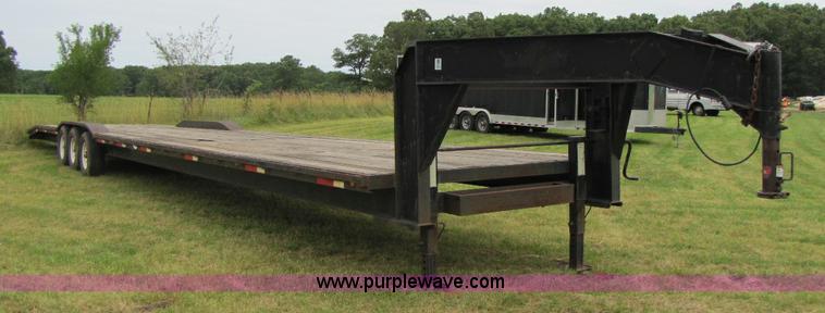 image for item A5096 2006 50' goose neck triple axle trailer