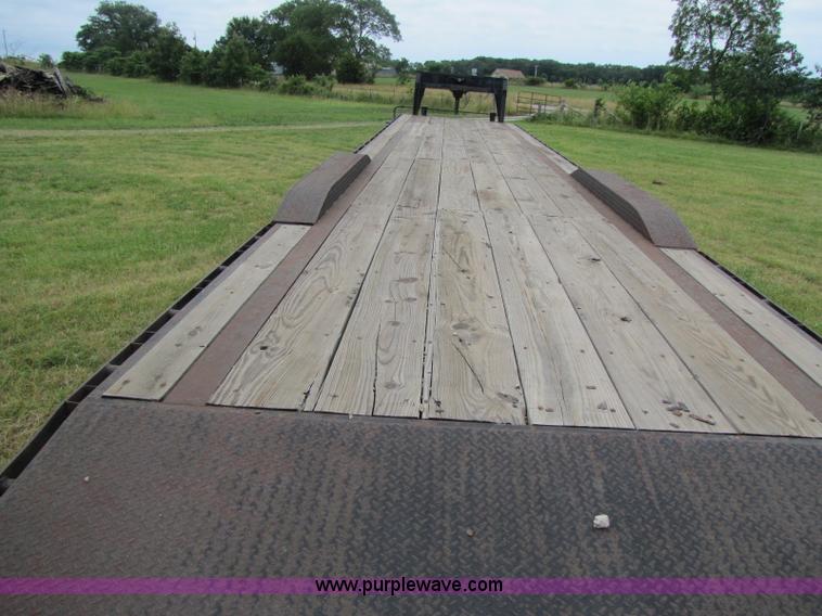 image for item A5096 2006 50' goose neck triple axle trailer