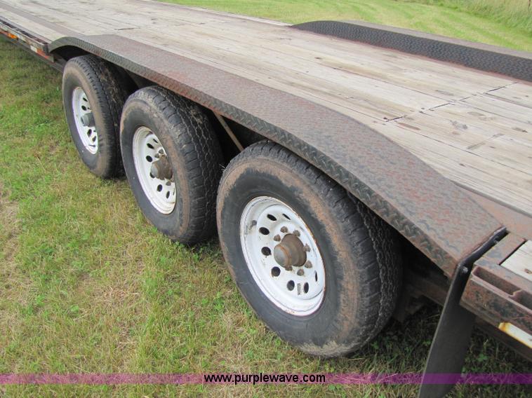 image for item A5096 2006 50' goose neck triple axle trailer