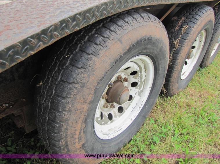 image for item A5096 2006 50' goose neck triple axle trailer