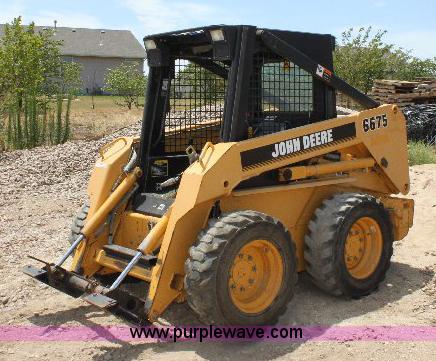 image for item A9304 John Deere 6675 skid loader