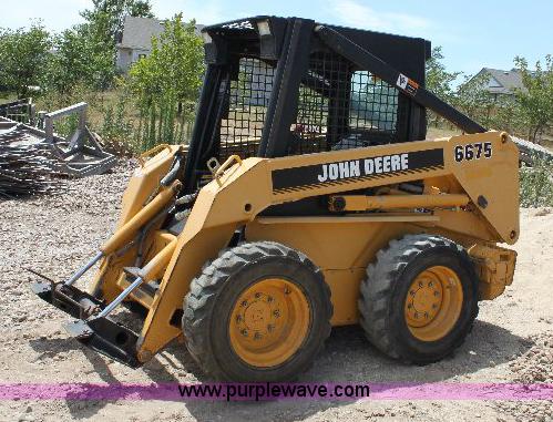 image for item A9304 John Deere 6675 skid loader
