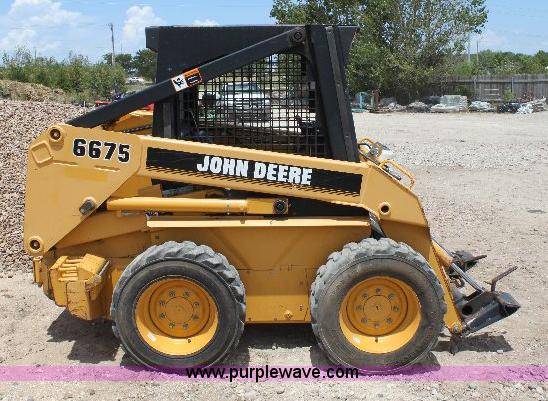 image for item A9304 John Deere 6675 skid loader