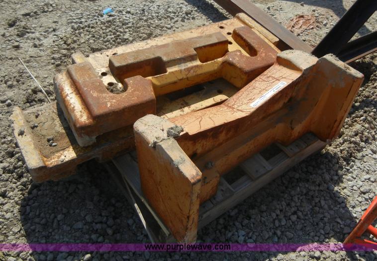 image for item A9860 (4) backhoe wheel weights