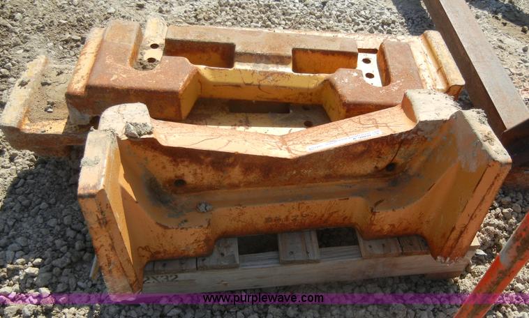 image for item A9860 (4) backhoe wheel weights