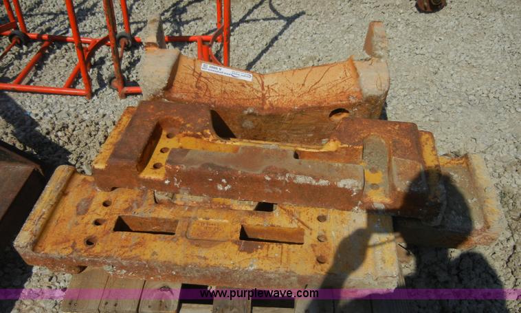 image for item A9860 (4) backhoe wheel weights
