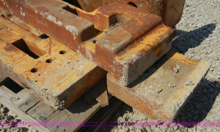 image for item A9860 (4) backhoe wheel weights