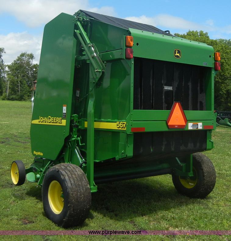 image for item A2111 2004 John Deere 567 round baler