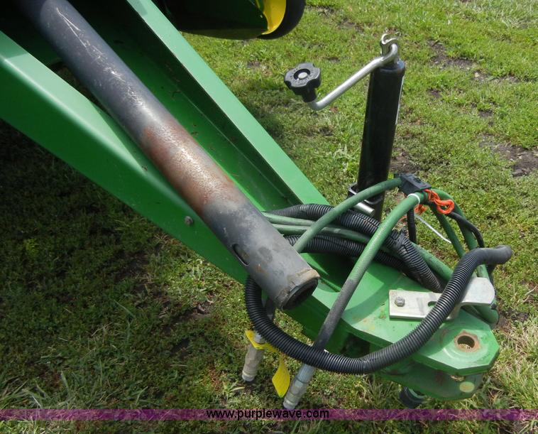 image for item A2111 2004 John Deere 567 round baler