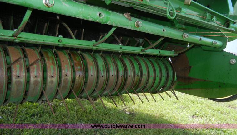 image for item A2111 2004 John Deere 567 round baler