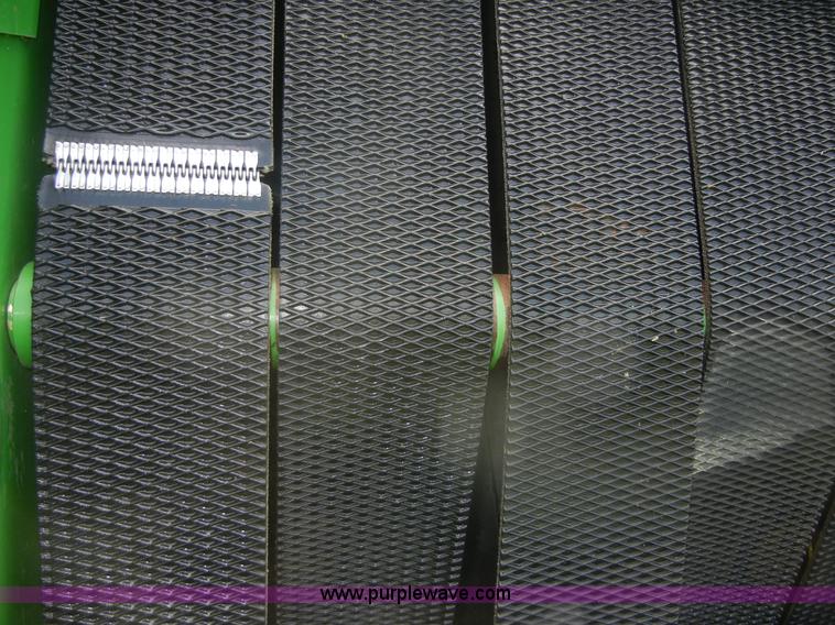 image for item A2111 2004 John Deere 567 round baler