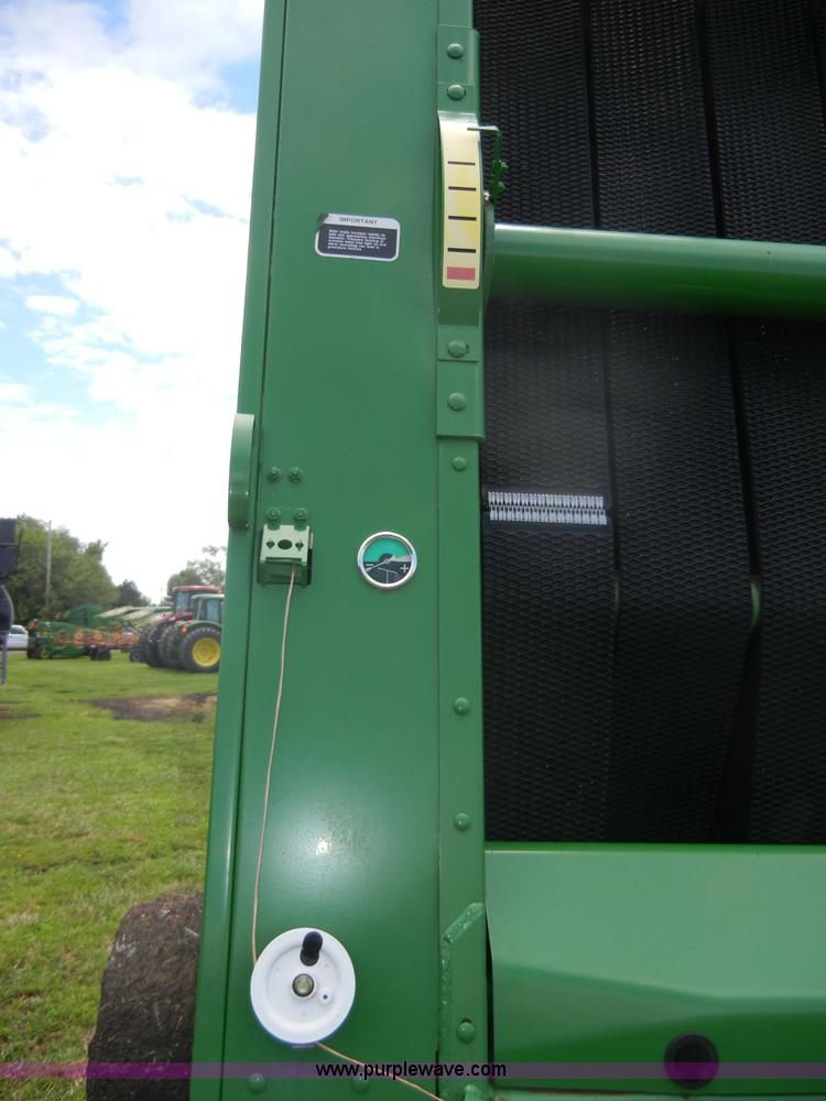 image for item A2111 2004 John Deere 567 round baler