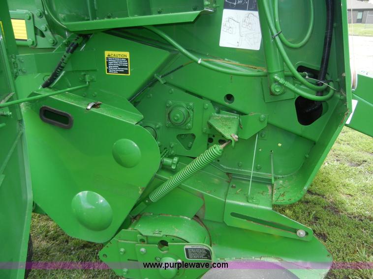 image for item A2111 2004 John Deere 567 round baler