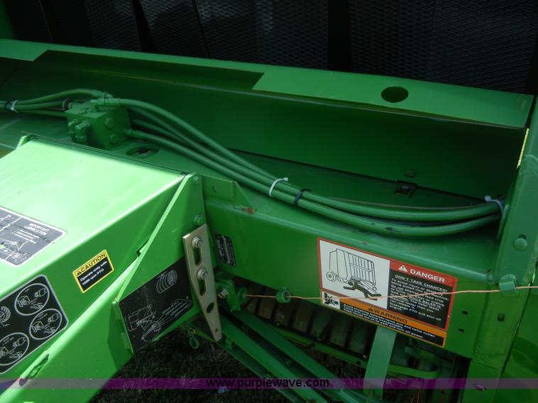 image for item A2111 2004 John Deere 567 round baler