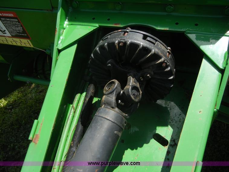 image for item A2111 2004 John Deere 567 round baler