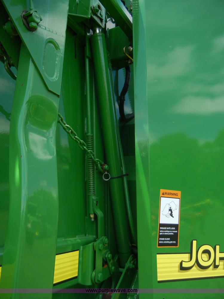 image for item A2111 2004 John Deere 567 round baler