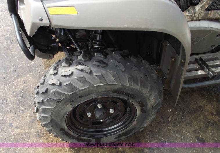 image for item A4202 2003 Bombardier Quest 650 camo four wheeler