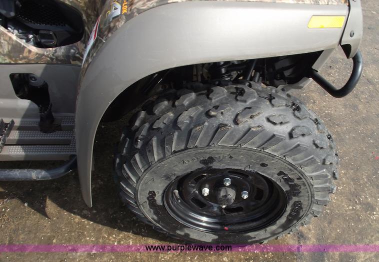 image for item A4202 2003 Bombardier Quest 650 camo four wheeler