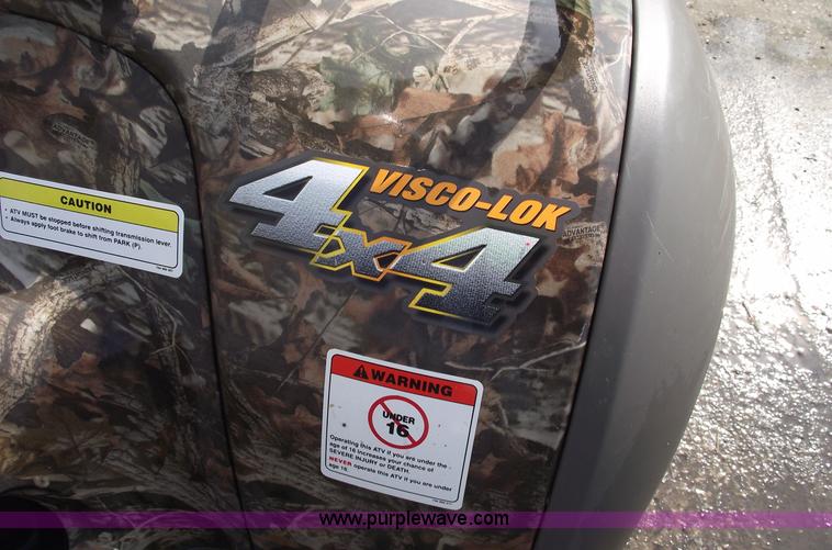 image for item A4202 2003 Bombardier Quest 650 camo four wheeler