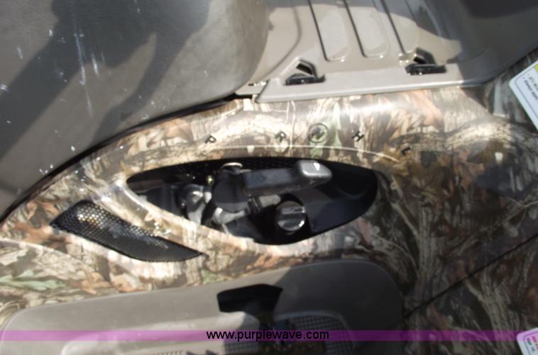 image for item A4202 2003 Bombardier Quest 650 camo four wheeler