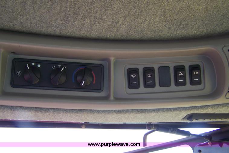 image for item A4588 New Holland H8040 swather